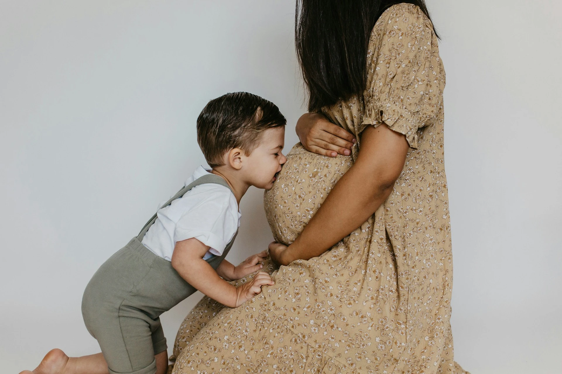 Pregnant woman receiving safe chiropractic care from female chiropractor in Balgowlah